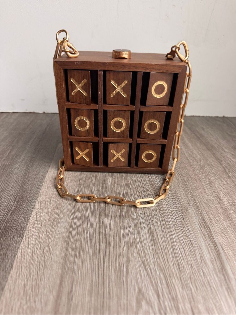 Cult Gaia Tic Tac Toe Clutch in Walnut $498